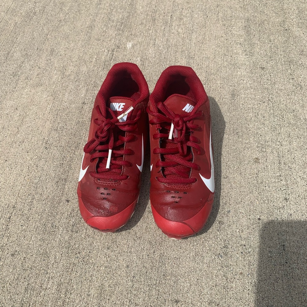 Nike youth size 2.5 football cleats, red